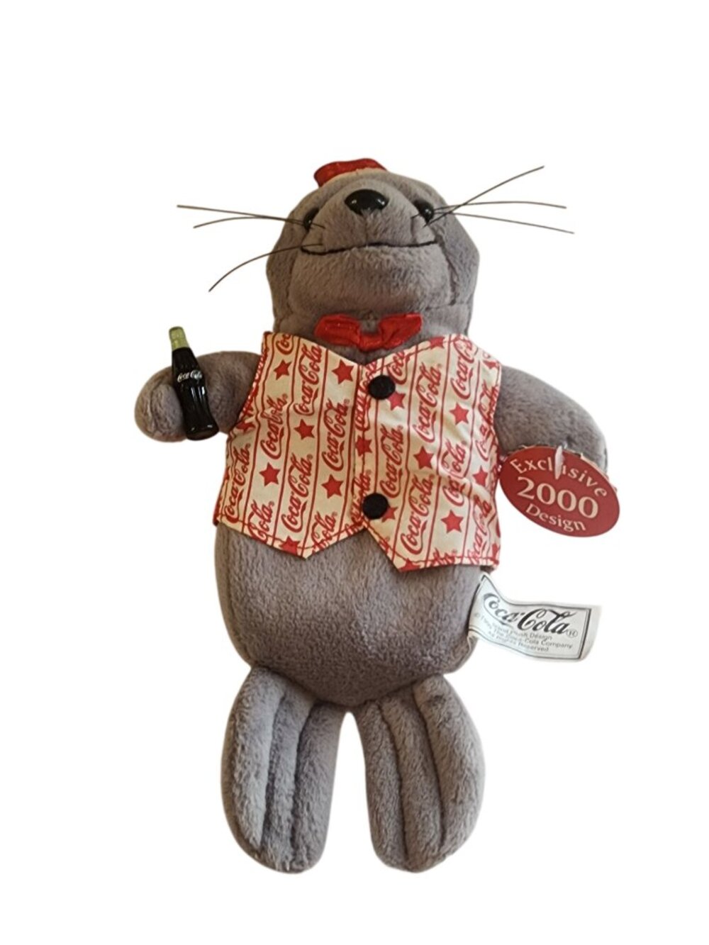 Vintage 2000 Coca-Cola plush bean bag seal holding a miniature soda bottle wear